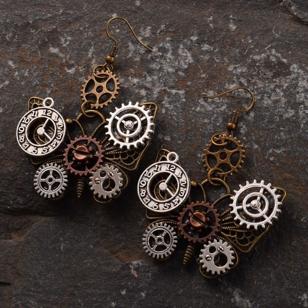 steampunk butterfly earrings on rock
