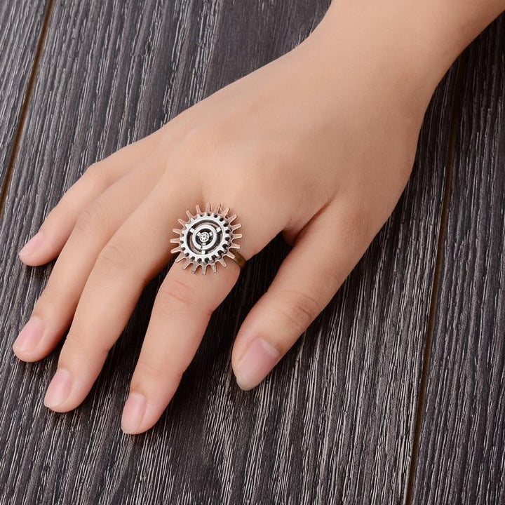 steampunk flower shaped ring on finger