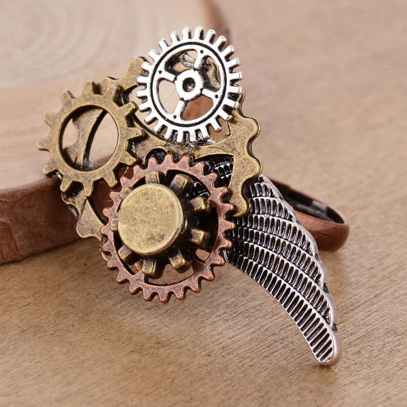 ring with gears and wing shape