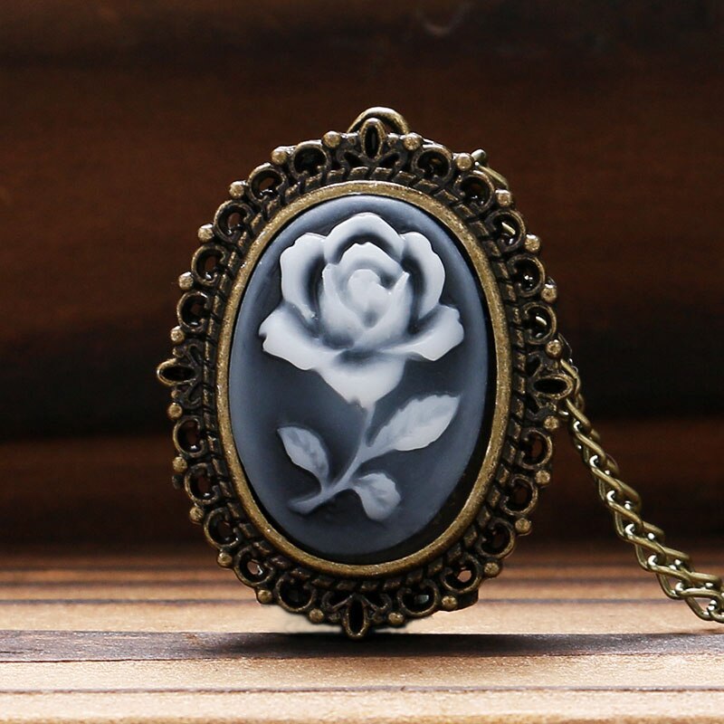 locket necklace with blue flower
