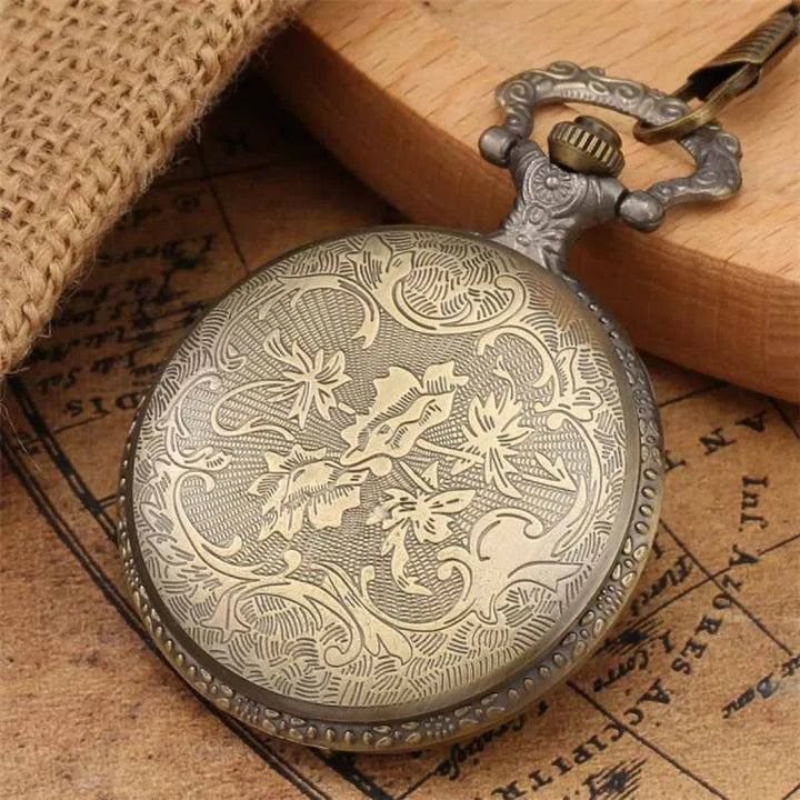 back of pocket watch with engravings