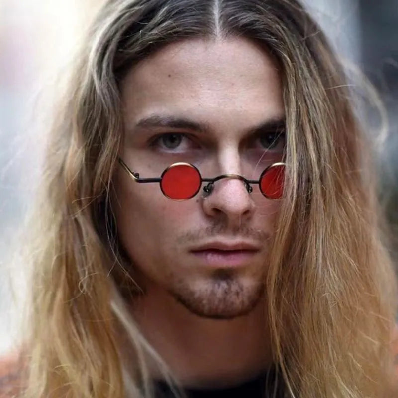 man wearing sunglasses with red lens