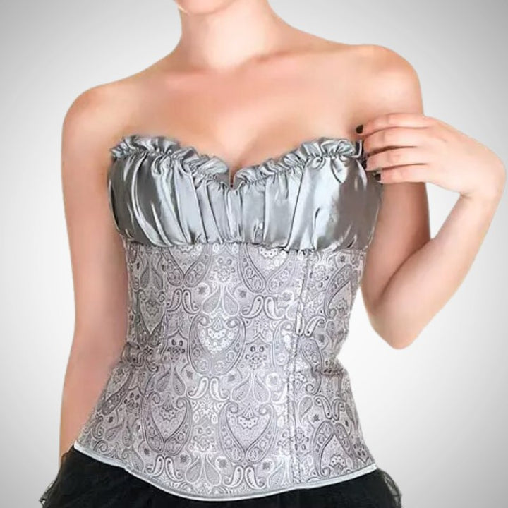 woman wearing a steampunk corset in silver color