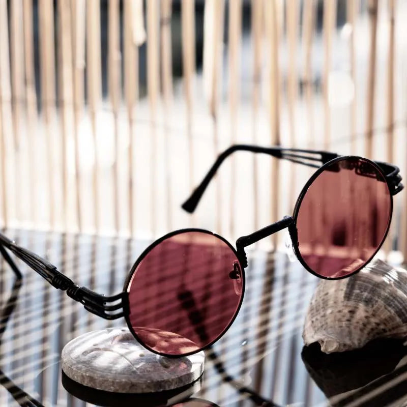 steampunk sunglasses with red lens and black frame