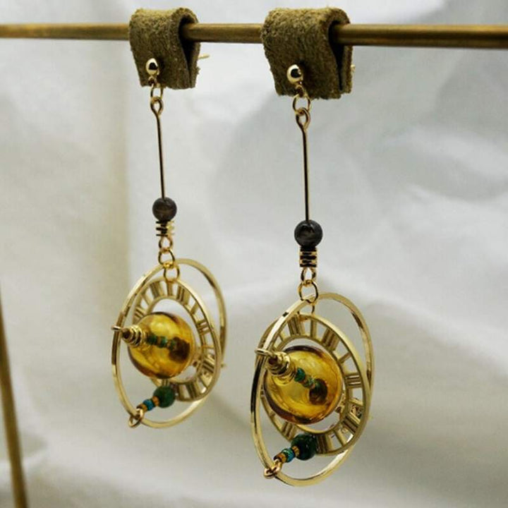 Steampunk planet earrings