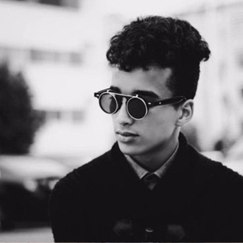 young man with steampunk sunglasses